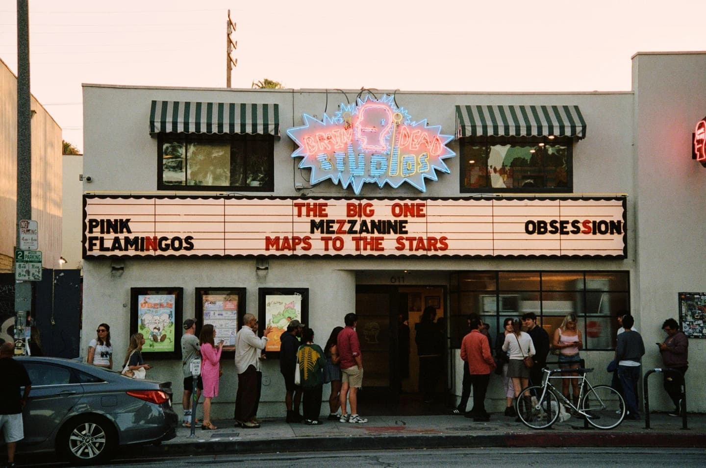 Cinema marquee announcing The Big One and Maps to the Stars