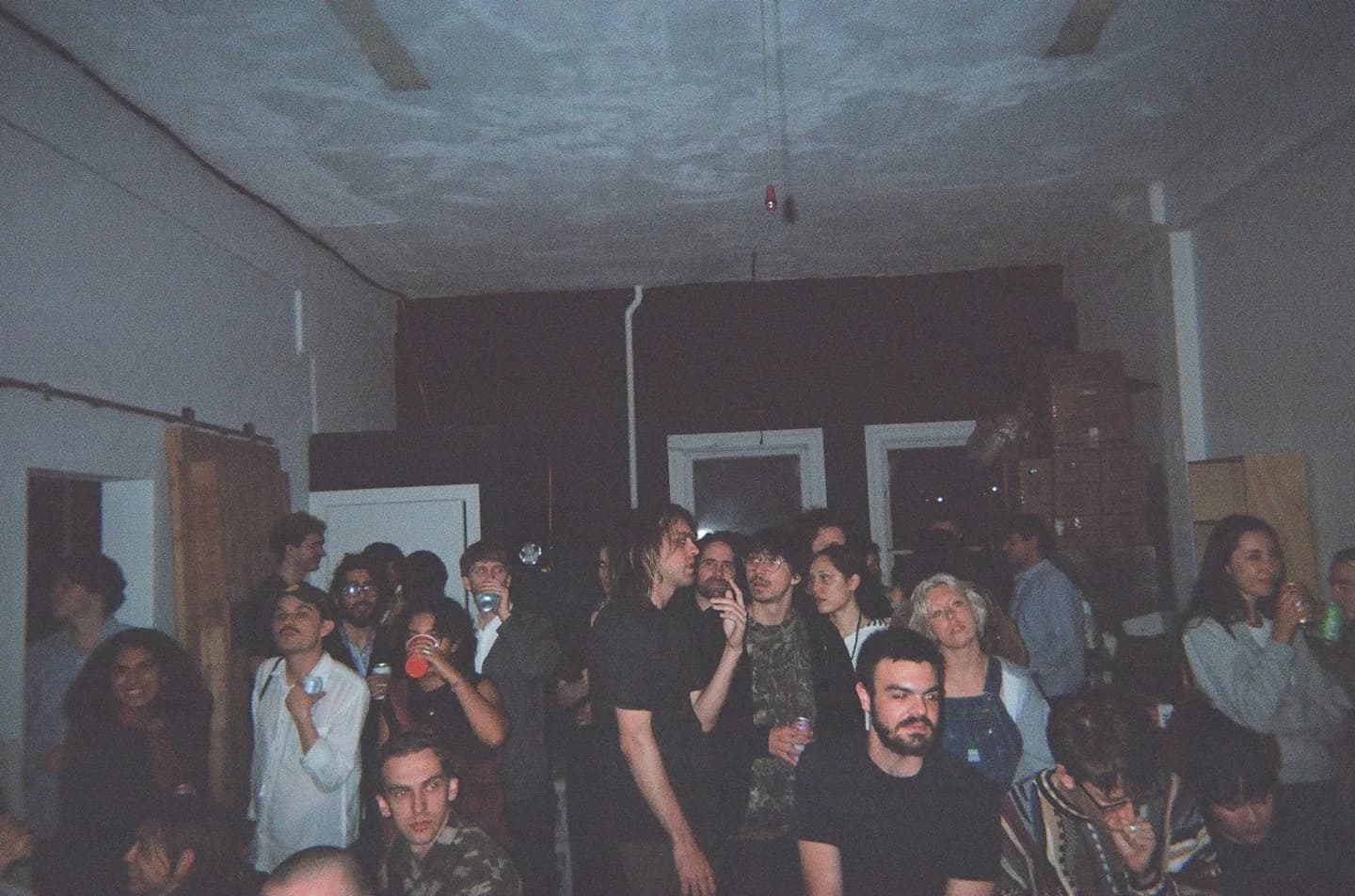 A crowd gathered inside an event space
