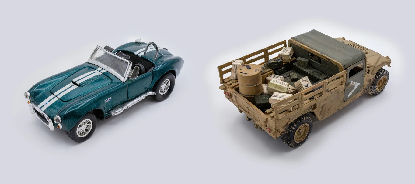 Shelby Cobra 427, 1/32 scale, Revell kit, portraying the 1966 model year; HMMWV “Humvee” in M1097A2 configuration, 1/35 scale, ICM kit with scratch-built cargo, portraying a US Army vehicle during the Iraq War, 2003–2005. Photo by Nicholas Woltersdorf.
